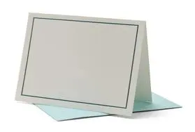 A white card with a blue border on top of it.